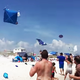 Illustration for article titled Blue Angel #5s Near-Supersonic Sneak Pass Sent Beach Umbrellas Flying